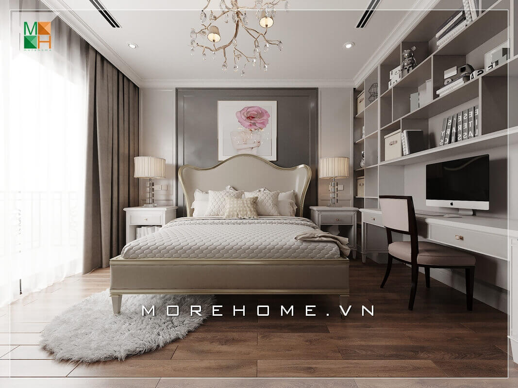 Ấn tượng với mẫu bàn làm việc phòng ngủ chung cư kết hợp kệ sách treo tường đẹp mắt, thiết kế phù hợp với không gian phòng ngủ. Điểm nhấn của căn phòng ngủ tân cổ điển ngoài chiếc giường ra thì cây đèn chùm treo trần và 2 đèn ngủ được đặt 2 bên đầu giường cũng hết sức tinh tế và sang trọng. Mẫu nội thất chung cư đẹp